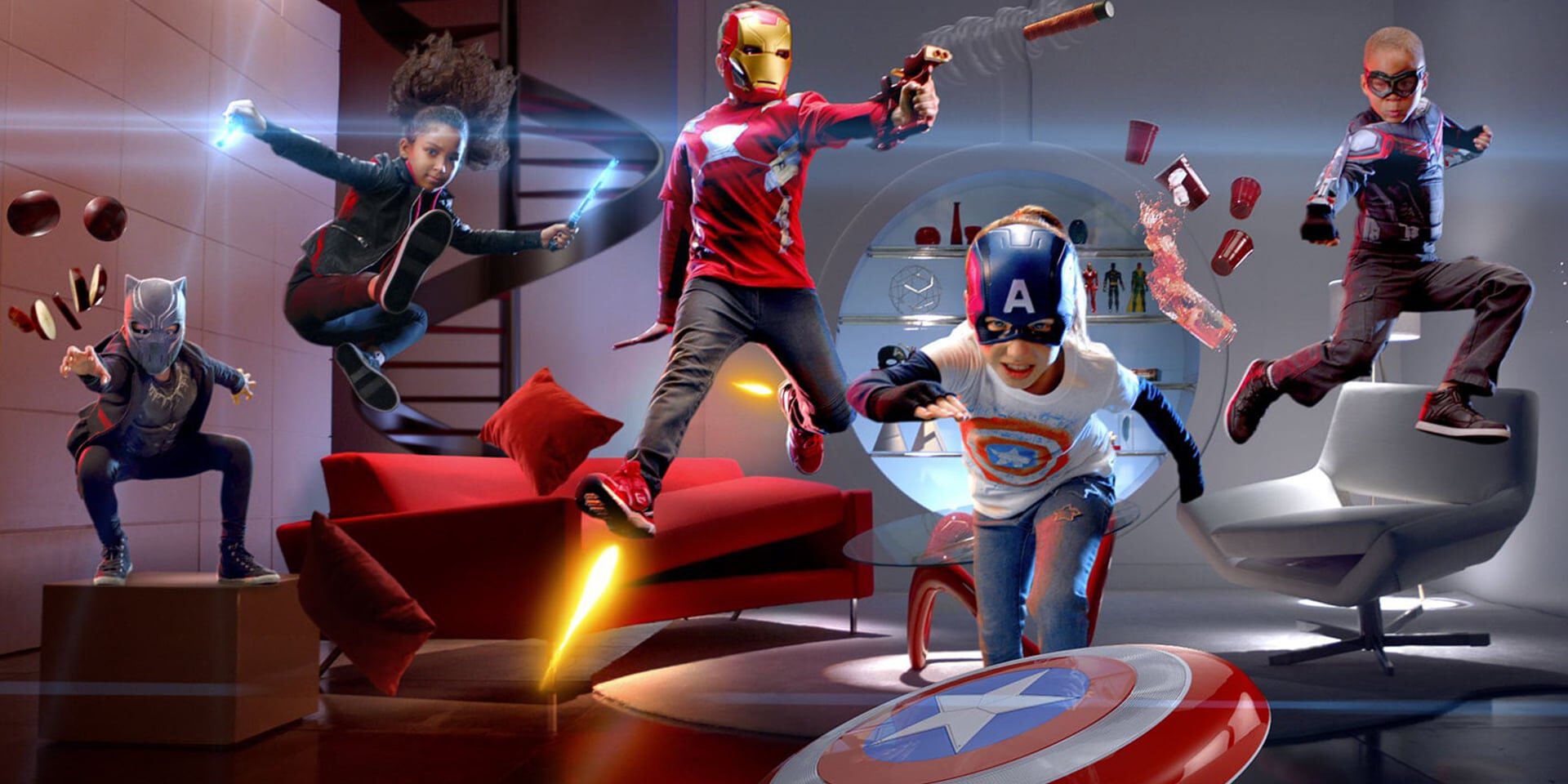 Five children in superhero costumes play dynamically in a modern living room.