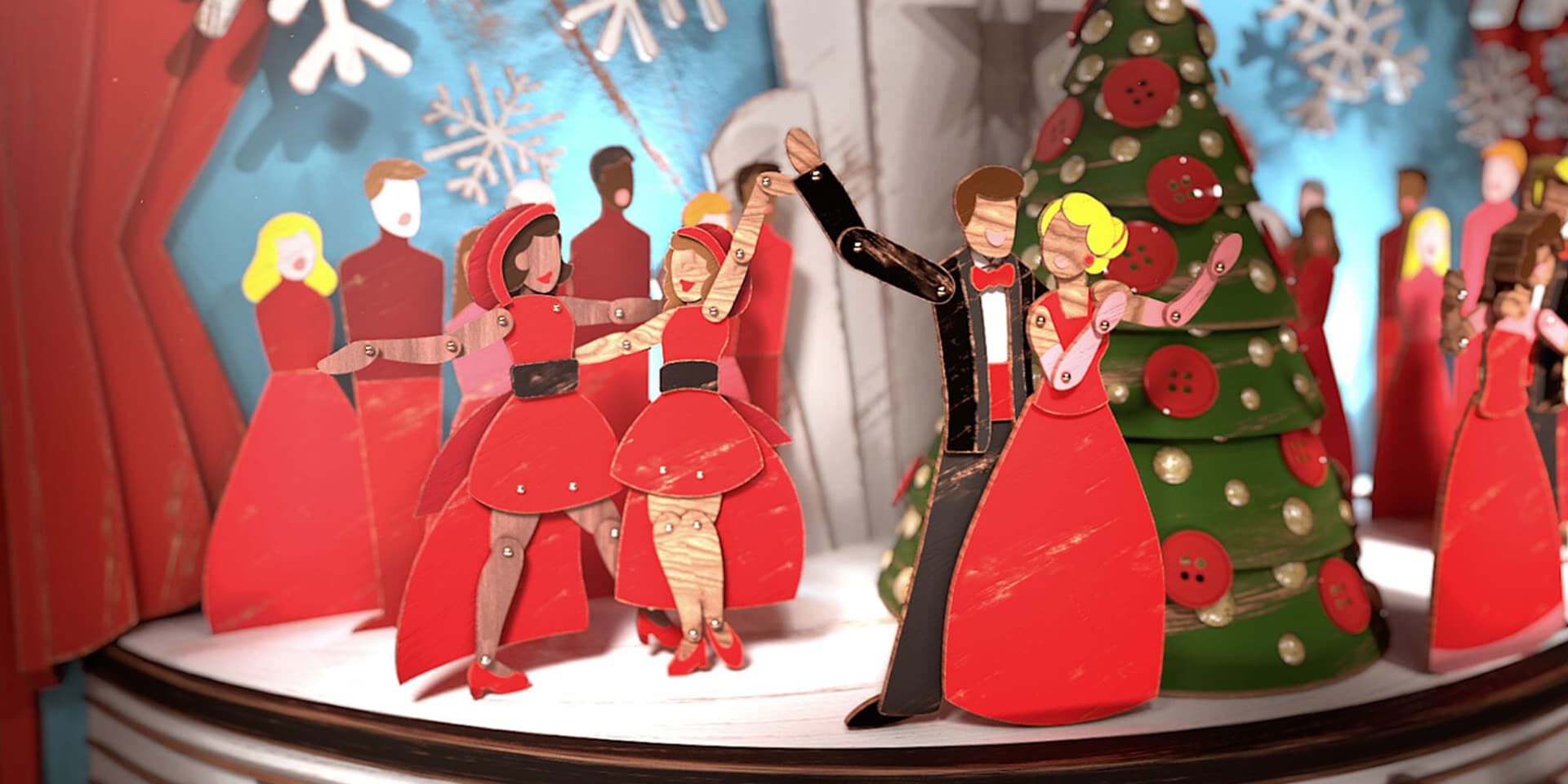 Paper cutout dancers in red gowns and tuxedo perform festive Christmas dance