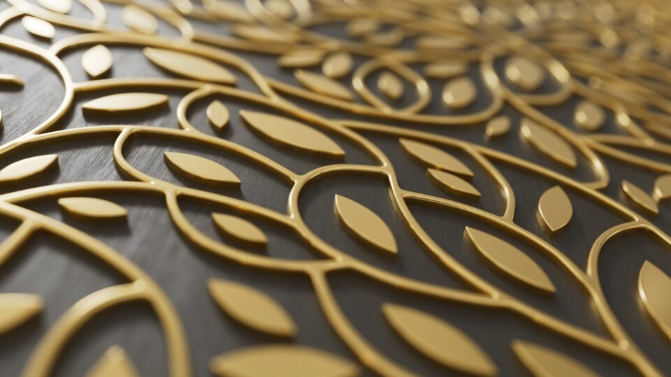 Golden leaf pattern on dark textured surface
