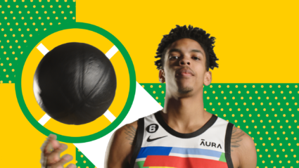 Young basketball player in Minnesota jersey holding a ball against colorful geometric background.